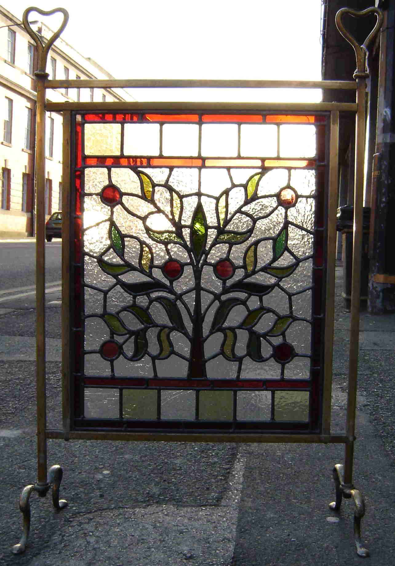 Artisan made window in original frame.
